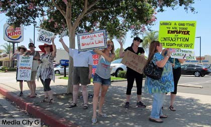 Photo: FLLewis/Media City G -- Protesters gathered at the parking lot entrance to Hobby Lobby in Burbank July 5, 2014