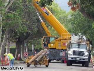 Photo: FLLewis / Media City G -- BWP crew and giant crane install new utility poles near 100 block of South Lamer Street Burbank April 7, 2015