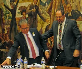 Photo: FLLewis / Media City G -- Dr. David Gordon steps aside to switch chairs with newly elected mayor Bob Frutos at city council reorganization meeting May 1, 2015