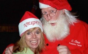 Photo: FLLewis/Media City G -- Flappers co-owner, Barbara Holliday and Santa Hollywood share a laugh on November 9, 2010