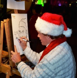 Photo: FLLewis/Media City G -- An artist creates a holiday sketch during Santa's Downtown Wonderland in Burbank December 1, 2010