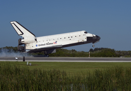 Space shuttle Atlantis touches down on Kennedy's Runway 33 at the conclusion of STS-132