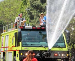 Photo: FLLewis/Media City G -- Bob Hope Airport fire truck demonstrated its powerful water spray during Burbank on Parade April 6, 2013