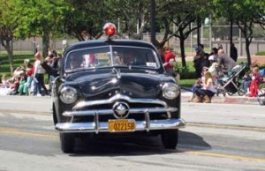 Photo: FLLewis/Media City G -- Burbank PD's 1949 Ford police cruiser takes a spin down West Olive Avenue in Burbank on Parade April 14, 2012