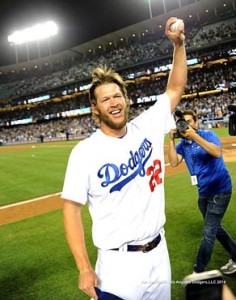 Dodger Clayton Kershaw holds up the game winning ball after pitching his first no hitter in the 8-0 win over the Rockies at Dodger Stadium June 18, 2014