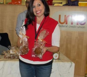Photo: FLLewis/Media City G -- Free Carmel apples handed out at the UMe Federal Credit Union in Burbank November 22, 2013