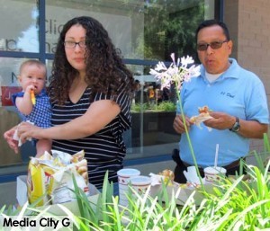 Photo: FLLewis/Media City G -- Some members hung out at the Burbank City Federal Credit Union eating free burgers today June 19, 2014