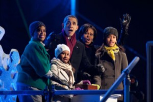 Photo: Chuck Kennedy/White House --President Obama gets help from mother-in-law Marian Robinson, daughters Sasha abd Malia, as well as First Lady Michelle Obama in pushing the button to light the National Christmas Tree, Washington DC, December 9, 2010