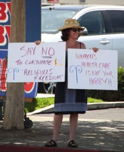 Photo: Grey Reyna Freelance Photog -- Burbank resident Tina McDermott protested in front of Hobby Lobby in Burbank July 12, 2014