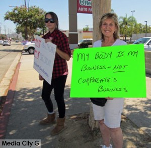 Photo: FLLewis/Media City G -- (l-r) Protesters Cassandra Huerlbut and Debbie Cherry in front of Hobby Lobby in Burbank July 26, 2014