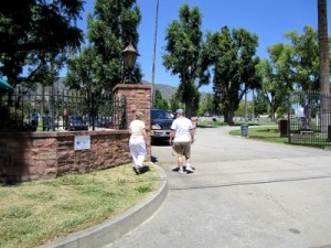 Photo: FLLewis/Media City G -- A couple approaches the open gate at Grand View Memorial Park Cemetery at 1341 Glenwood Road in Glendale on Memorial Day, May 30, 2011 