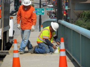 Photo: FLLewis/Media City G -- Los Angeles County workers repaired damage on Magnolia Boulevard bridge March 22, 2011