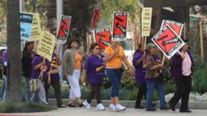 Photo: Terje Canavarro/Freelance photographer -- Demonstrators carried signs like, "Justice for Janitors" in Media District of Burbank March 30, 2012