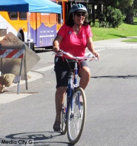 Photo: FLLewis / Media City G -- Ex-council member/ Burbank representative on Metropolitan Water District of Southern California board of directors, Marsha Ramos, took a spin on her bicycle along the Burbank on Parade route April 23, 2016