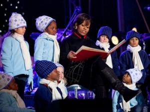 Photo: Pete Souza/White House -- First Lady Michelle Obama reads "Twas the Night Before Christmas" to children at the National Christmas Tree lighting ceremony in Washington DC on December 9, 2010