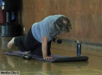 Photo: FLLewis / Media City G -- Participant performed balance exercise with weight during Pilates class at the Verdugo Park Recreation Center in Burbank August 27, 2014