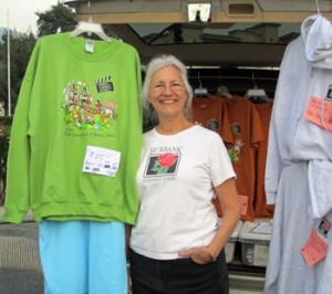 Photo: FLLewis/Media City G -- Volunteer Robin Hanna sold Burbank Rose float merchandise in Burbank January 3, 2014