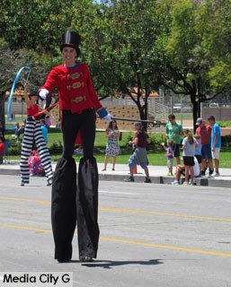 Photo: FLLewis / Media City G -- Stilt walkers performed along the route in Burbank on Parade April 23, 2016