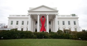 Photo: Lawrence Jackson/White House -- A red ribbon for World AIDS Day is displayed on the North Portico of the White House, November 30, 2010