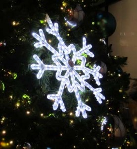 Photo: FLLewis/Media City G -- A snowflake ornament on the huge walk-through Christmas tree on the AMC walkway in Downtown Burbank December 16, 2012