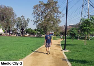 Photo: FLLewis/ Media City G -- Guy took in the view of the newly designed Johnny Carson Park in Burbank July 1, 2016