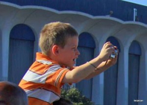 Photo: Terje "Terry" Canavarro/Freelance photog -- A young fan acts as photographer during Endeavour stop at the Forum in Inglewood October 13, 2012