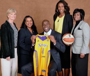 WNBA photo (l-r) Sparks coach Carol Ross, WNBA President Laurel Richie, Sparks owner Magic Johnson, former Sparks star Lisa Leslie, and Sparks GM Penny Toler