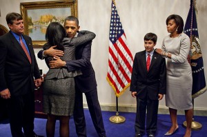 Photo: Pete Souza/White House -- President Obama and First Lady Michelle Obama greet the family of Christina Taylor Green after the State of the Union address in Washington DC January 25, 2011