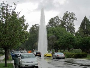 Photo: FLLewis/ Media City G -- A broken hydrant for reclaimed water blew water more than 30 feet into the air on California Street in Burbank May 6, 2013